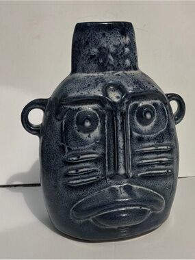 blue speckled face jug pottery